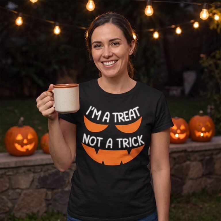 black t-shirt printed with a large orange carved pumpkin face reading I am a treat not a trick, worn by a woman at an evening Halloween gathering